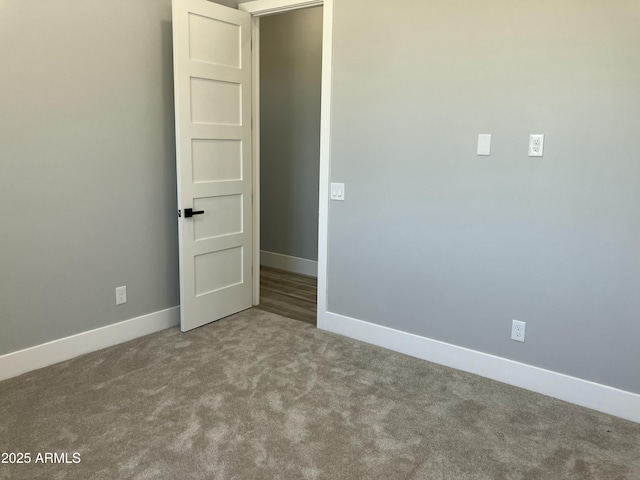 4079 E Roosevelt St, Apache Junction, AZ 85119 - empty room with carpet floors and baseboards