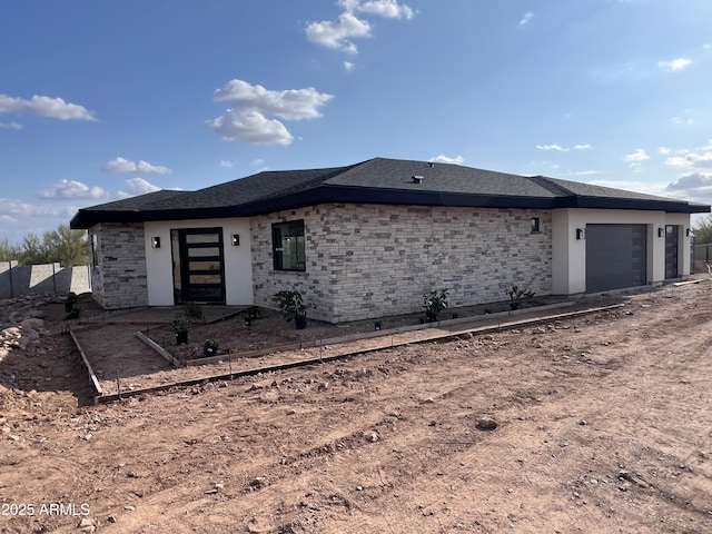 4079 E Roosevelt St, Apache Junction, AZ 85119 - view of front facade featuring an attached garage