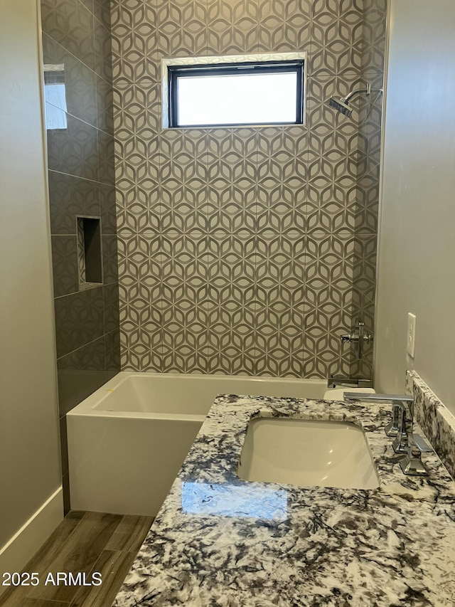 4079 E Roosevelt St, Apache Junction, AZ 85119 - full bath with wood finished floors, a tub, and vanity