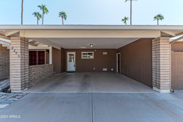 exterior space featuring a carport