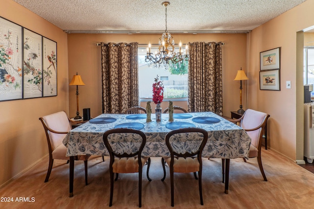 dining area featuring carpet floors, a textured ceiling, and a chandelier