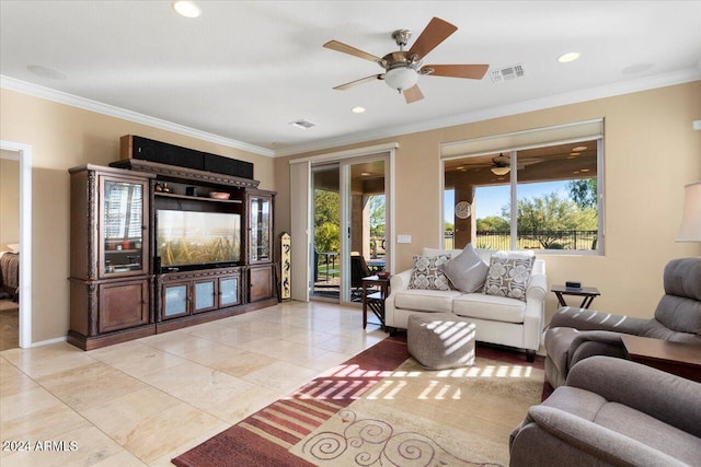 living room featuring light tile patterned flooring, ceiling fan, and crown molding