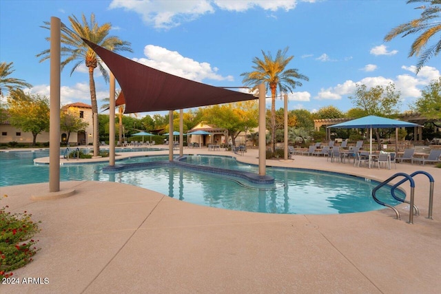 view of swimming pool featuring a patio