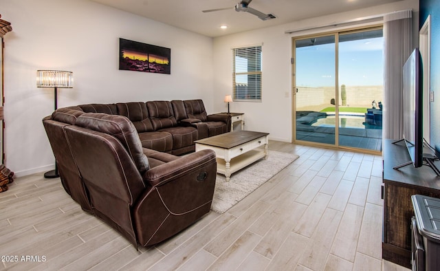 living room featuring ceiling fan