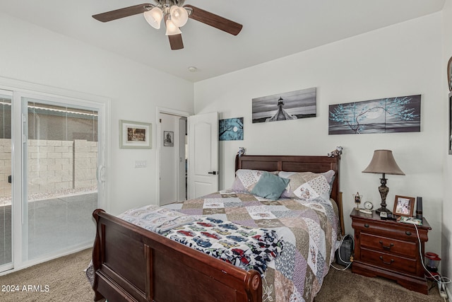 bedroom featuring ceiling fan and carpet