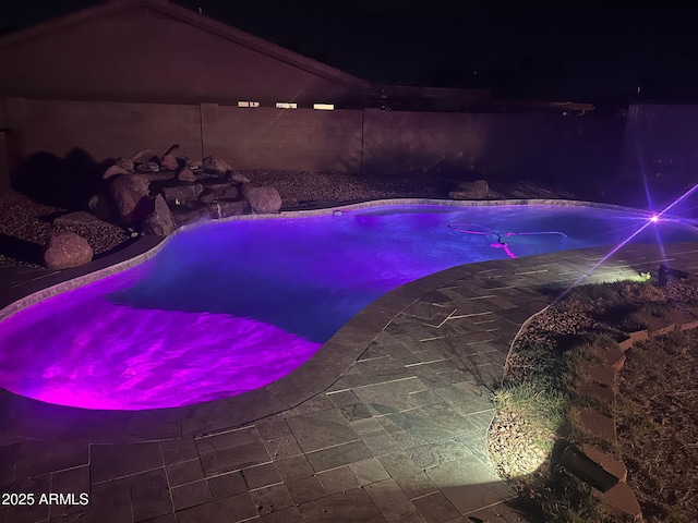 15019 W Banff Ln, Surprise, AZ 85379 - view of pool at twilight