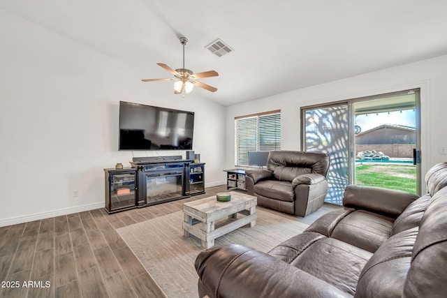 15019 W Banff Ln, Surprise, AZ 85379 - living area featuring ceiling fan, vaulted ceiling, and wood finished floors