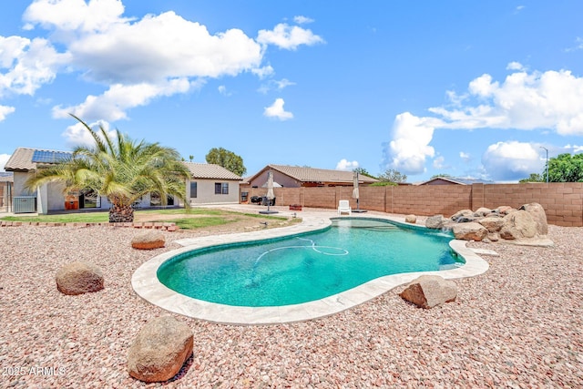15019 W Banff Ln, Surprise, AZ 85379 - view of swimming pool with a fenced backyard and a patio