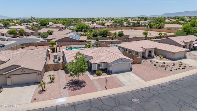 15019 W Banff Ln, Surprise, AZ 85379 - aerial perspective of suburban area with mountains
