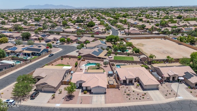 15019 W Banff Ln, Surprise, AZ 85379 - aerial perspective of suburban area with a mountainous background