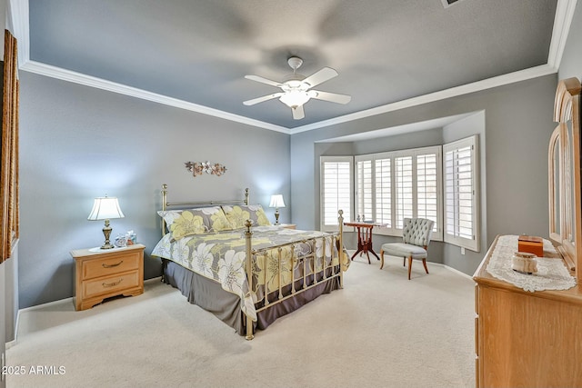 bedroom featuring carpet floors, ornamental molding, a ceiling fan, and baseboards