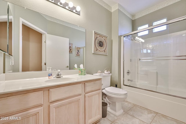 full bath featuring toilet, ornamental molding, enclosed tub / shower combo, vanity, and tile patterned flooring