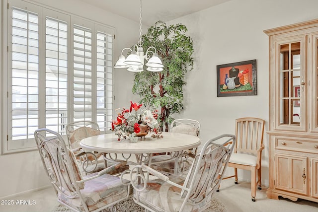 dining room with an inviting chandelier