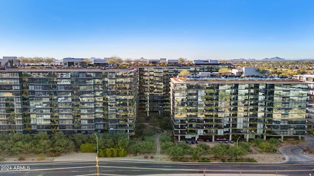 view of building exterior featuring a mountain view