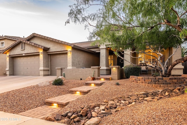 4422 E Spur Dr, Cave Creek, AZ 85331 - view of front of property with a garage, driveway, a tiled roof, and stucco siding