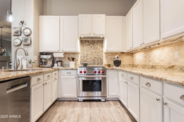 4422 E Spur Dr, Cave Creek, AZ 85331 - kitchen with stainless steel appliances, a sink, and white cabinetry