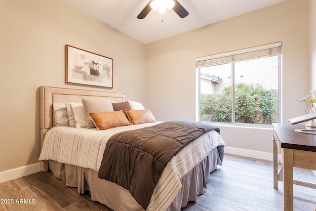4422 E Spur Dr, Cave Creek, AZ 85331 - bedroom with baseboards, wood finished floors, and a ceiling fan