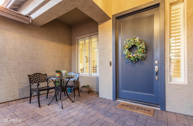 4422 E Spur Dr, Cave Creek, AZ 85331 - view of exterior entry with stucco siding and a patio