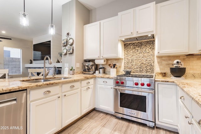 4422 E Spur Dr, Cave Creek, AZ 85331 - kitchen featuring appliances with stainless steel finishes, a sink, tasteful backsplash, and white cabinetry