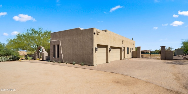 view of home's exterior with a garage