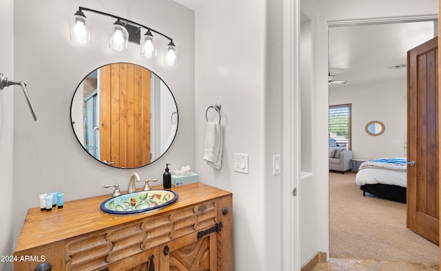 bathroom with vanity and ceiling fan