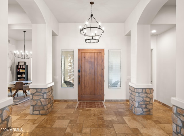 entrance foyer with an inviting chandelier