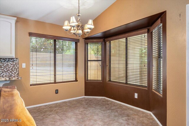 45131 W Horse Mesa Rd, Maricopa, AZ 85139 - unfurnished dining area featuring a chandelier and lofted ceiling