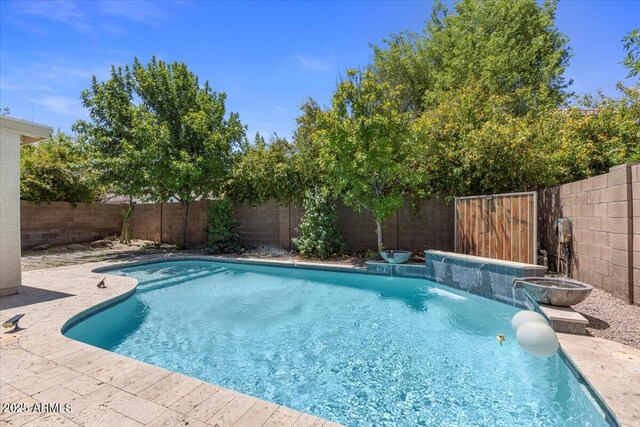 45131 W Horse Mesa Rd, Maricopa, AZ 85139 - view of swimming pool with a fenced backyard