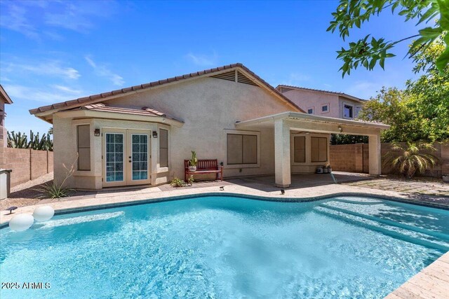 45131 W Horse Mesa Rd, Maricopa, AZ 85139 - view of swimming pool with french doors, a fenced backyard, and a patio area