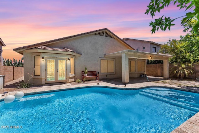 45131 W Horse Mesa Rd, Maricopa, AZ 85139 - view of swimming pool with french doors, a patio area, and a fenced backyard