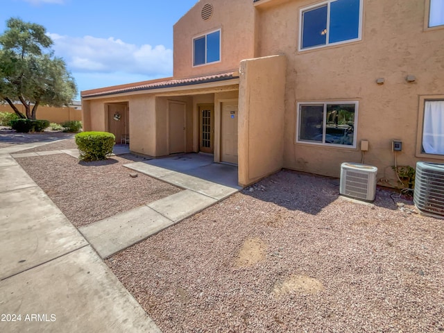 exterior space featuring a patio area and central AC unit