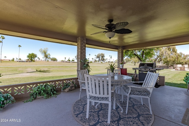 view of patio featuring grilling area and ceiling fan