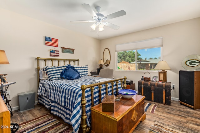 bedroom featuring ceiling fan and hardwood / wood-style floors