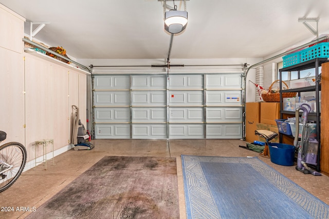 garage featuring a garage door opener