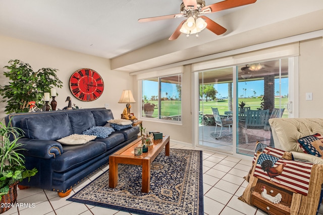 living room featuring ceiling fan and light tile patterned floors