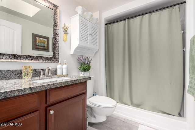 bathroom with tile patterned floors, curtained shower, toilet, and vanity