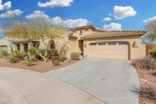 mediterranean / spanish house featuring a garage