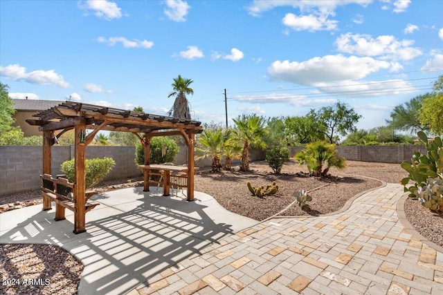 view of patio featuring a pergola