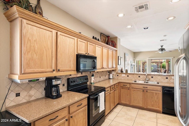 kitchen with ceiling fan, light tile patterned floors, sink, tasteful backsplash, and black appliances