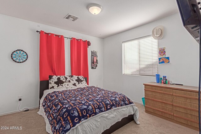 bedroom featuring carpet flooring