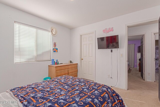 bedroom featuring carpet flooring