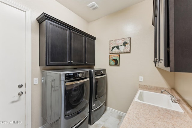 7511 S Parkcrest St, Gilbert, AZ 85298 - washroom with washing machine and clothes dryer and cabinet space
