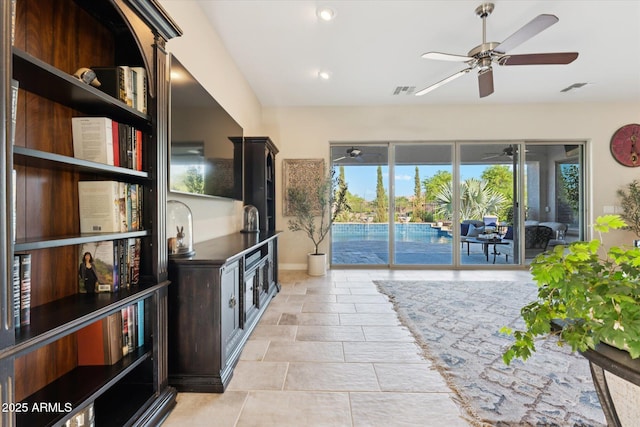 7511 S Parkcrest St, Gilbert, AZ 85298 - living room with a ceiling fan and recessed lighting