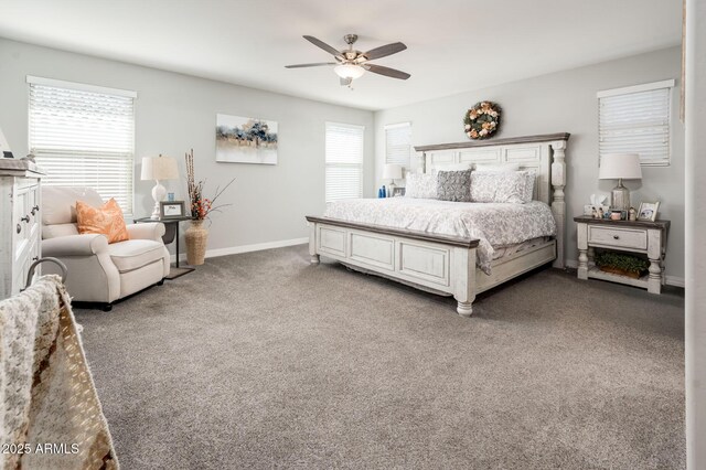 bedroom with multiple windows, carpet floors, baseboards, and ceiling fan