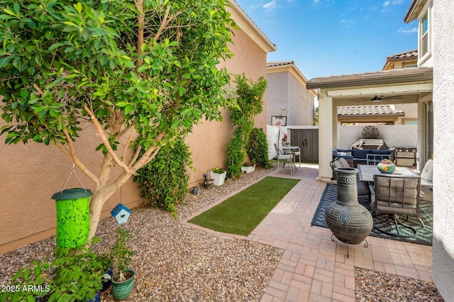fenced backyard featuring a patio
