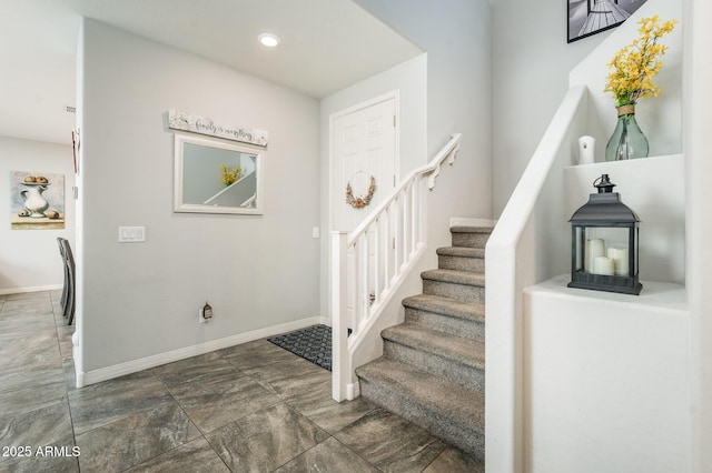 stairway with baseboards