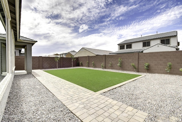 view of yard featuring a patio area