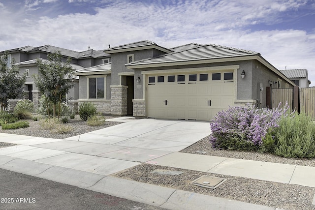 prairie-style home featuring a garage