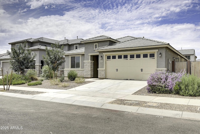 prairie-style house featuring a garage