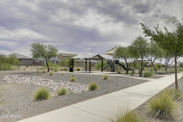 view of property's community with a playground